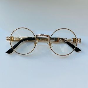 clear sunglasses with gold designs